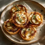 Golden Apple, Brie, and Honey Tart with melted cheese and a honey drizzle.