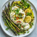 Delicious Grilled Asparagus with Burrata and lemon dressing.